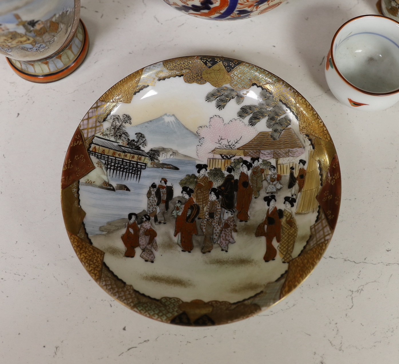 Assorted Japanese ceramics including an Imari bottle vase, a Satsuma vase and Kutani eggshell porcelain